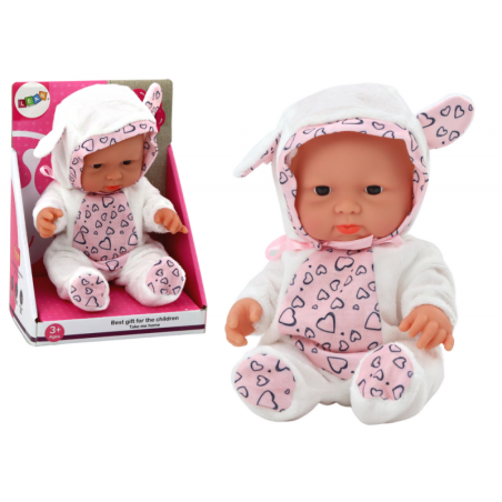 Väike beebinukk, valged riided, müts, vibu, kõrvad