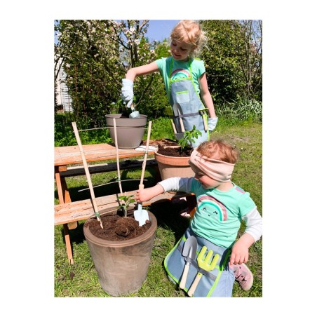 Laste kõhukott aiatööriistadega