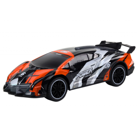 Kaugjuhitav sportauto RC 1:10 oranž kiirus – kuni 25 km/h