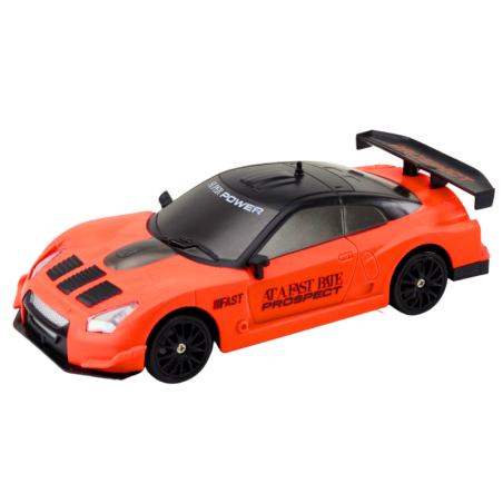 Kaugjuhitav R/C sportauto 1:24 oranžid vahetatavad rattad