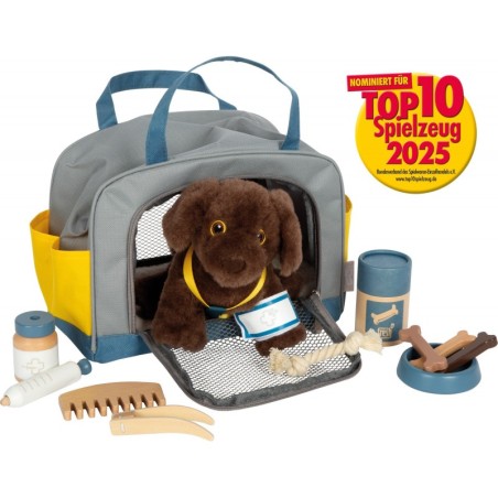 Koer kandekoti ja hoolduskomplektiga
