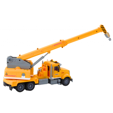 Kollane veoauto kraana hõõrdeajamiga valguse ja heliefektidega