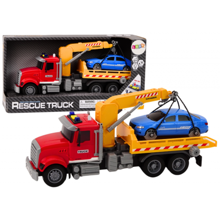 Kraanaga puksiirauto, mille tuled põlevad