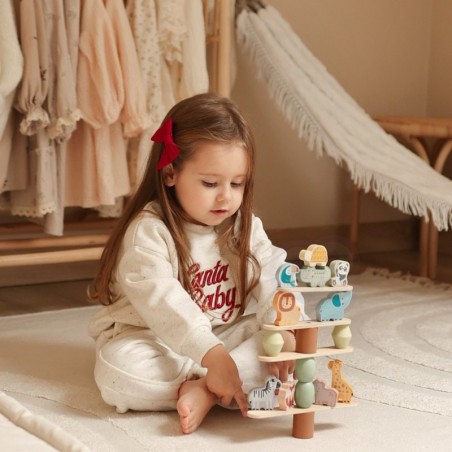 Tasakaalu ladumistorn pusle loomadega